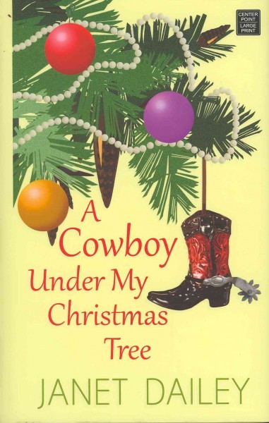 A cowboy under my Christmas tree / Janet Dailey.